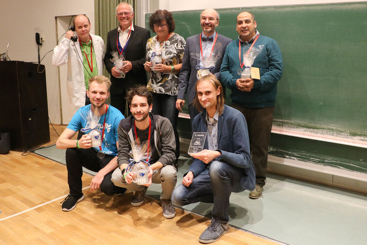 Die erfolgreichen Slammer mit dem glücklichen Sieger Christian Schmitz, sitzend rechts. 