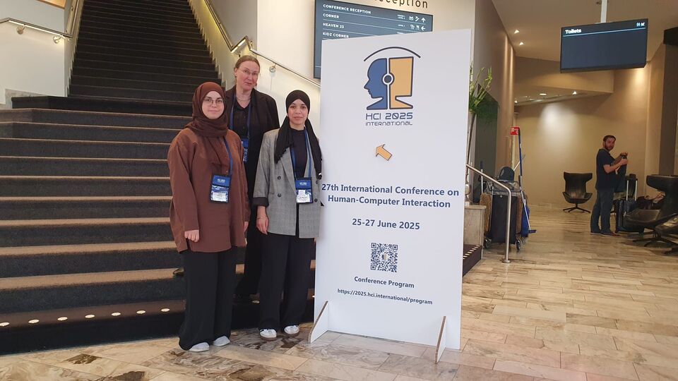 Prof. Dr. Eigenstetter, BA Sc. Dönmez und MA Sc. El Moussaoui auf der HCI